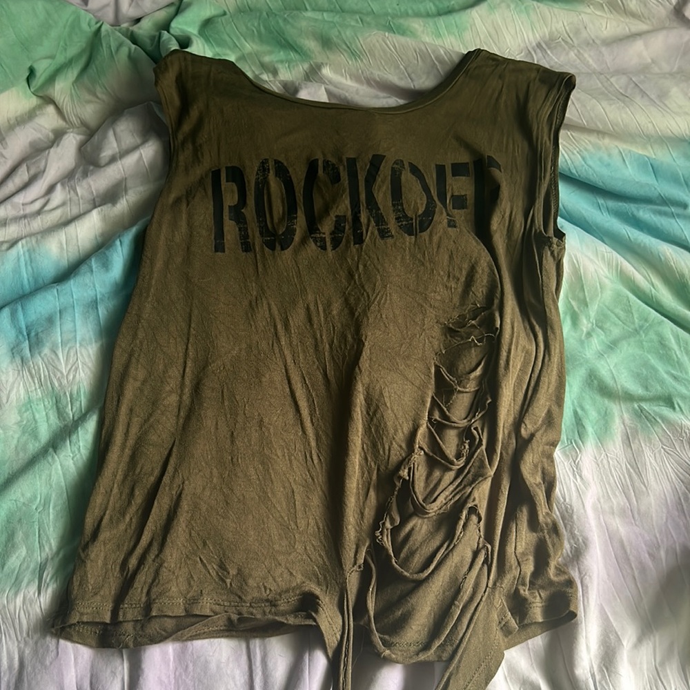 From the store Dennys size small Rockoff shredded tank top.